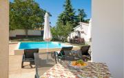 Three-Bedroom Holiday Home In Divsici