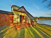 Holiday house by the lake with a fireplace Holiday house by the lake with a fireplace