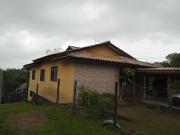 Casa amarela no Rosa