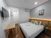 Top Tanah Merah