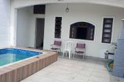 Casa com piscina praia grande