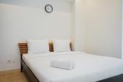 Cozy and Spacious 1BR Apartment at Branz BSD City By Travelio