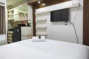Convenient Studio Apartment at Vida View Makassar By Travelio