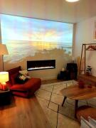 Le Patio - Cinélodge avec jardin