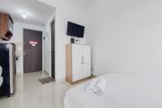 Cozy and Enjoy Living Studio Room at Serpong Garden Apartment By Travelio
