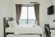 Cozy and Nice Studio at Sky House BSD Apartment By Travelio