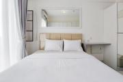 Cozy Living and Comfort Studio at Sky House BSD Apartment By Travelio