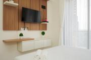 Well Appointed and Homey Studio at Sky House BSD Apartment By Travelio