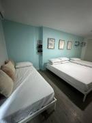 Studio w projector Wifi Netflix and pool access in ADB Tower Ortigas CBD