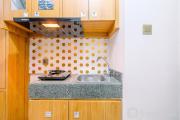 Cozy and Homey Studio Room Transpark Cibubur Apartment By Travelio