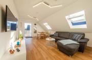Merlin Ausguck - Familienfreundliche Dachgeschosswohnung mit Morgensonne