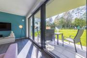 Bewusstsein - Modernes Apartment mit Terrasse, Walk-In-Dusche & Wellnesszugang