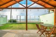 Casa na beira da praia do Perequê SC AAF378