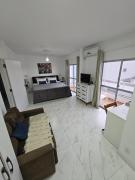 Suíte privada no apartamento frente ao mar
