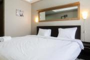 Minimalist Studio The Oasis Apartment near Omni Hospital Cikarang By Travelio