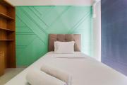 Modern Look Studio at Sky House Alam Sutera Apartment By Travelio
