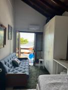 Quarto beira mar - tombo - guarujá