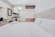 Minimalist Studio at Poris 88 Apartment By Travelio