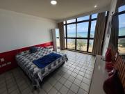 Flat Golden Beach beira mar