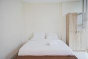 Comfort and High Floor Studio at Brooklyn Alam Sutera Apartment By Travelio