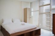 Comfort and High Floor Studio at Brooklyn Alam Sutera Apartment By Travelio