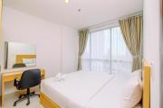 Comfort 1BR at Ciputra World 2 Apartment By Travelio