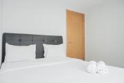 Comfy and Tidy 1BR The Mansion Kemayoran Apartment near JIEXPO By Travelio