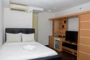 Fully Furnished with Cozy Design Studio Bassura City Apartment By Travelio