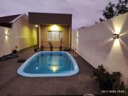 Casa com piscina , ar condicionado e churrasqueira no balneário Eliana