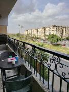 Flat at prime location with wifi and garden view near CAI airport