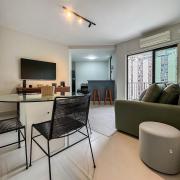 Flat com serviços e vista mar