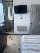 Room cerca al aeropuerto