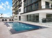 Modern 2BR with City Views & Pool Near Parramatta