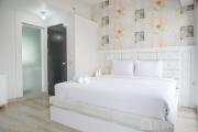 Warm and Comfort Living 1BR at 8th Ambassade Kuningan Apartment By Travelio