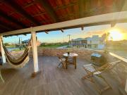 Aptos exclusivos com varanda ou terraço com Pôr do sol, cozinha privativa e equipada, Wi-Fi 600MBs, a 700m da praia de Itapirubá e 1km da BR-101