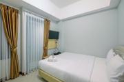 Nice and Elegant 1BR at Royal Heights Apartment By Travelio