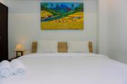 A Luxury 1BR Bali Style Apartment at Branz BSD City By Travelio