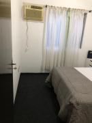 Quarto a 50 metros da praia