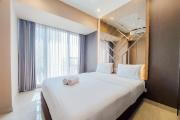 Scenic and Comfortable 2BR Branz BSD City Apartment By Travelio