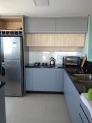 Amplo apartamento em Torres - 4 dormitórios