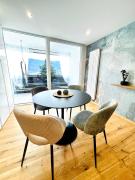 See-Apartment AURA am Fuße der Gerlitzen Alpe und Ufer des Ossiacher Sees - mit privatem Seezugang & Hallenbad