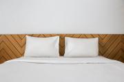 Minimalist and Cozy 1BR Patraland Urbano Apartment By Travelio