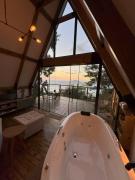 Vista Mar e Banheira de hidromassagem - Chalé Shánti - Florianópolis - SC - Brasil