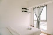 Comfort and Modern Look 2BR Apartment M-Town Signature By Travelio