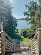 Modern Glass House With A View Over Lake Lejondal