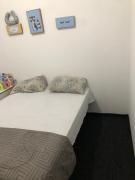 Quartos a 50 metros da praia