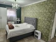 Tia Maria bachelor apartment