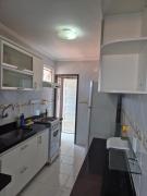 Apartamento com três quartos pé na areia