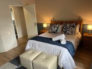 Spacious George self catering apartment for families, golfers, business travellers and couples 1 queen bed 2 sleeper couches