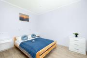Przestrzenny Apartament w Kołobrzegu by Noclegi Renters